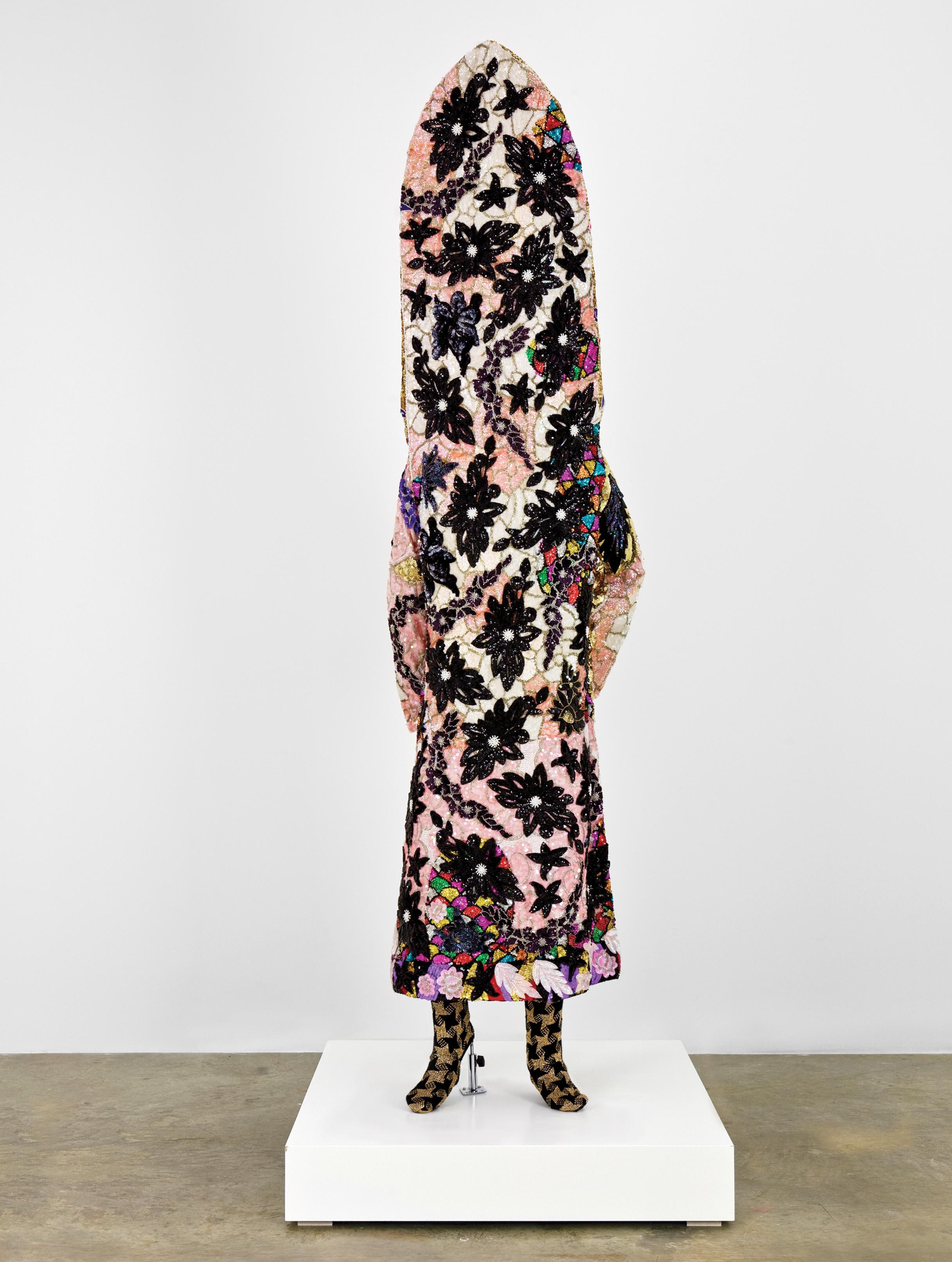 One of artist Nick Cave's Soundsuits, made of fabric, sequins, fiberglass, and metal.