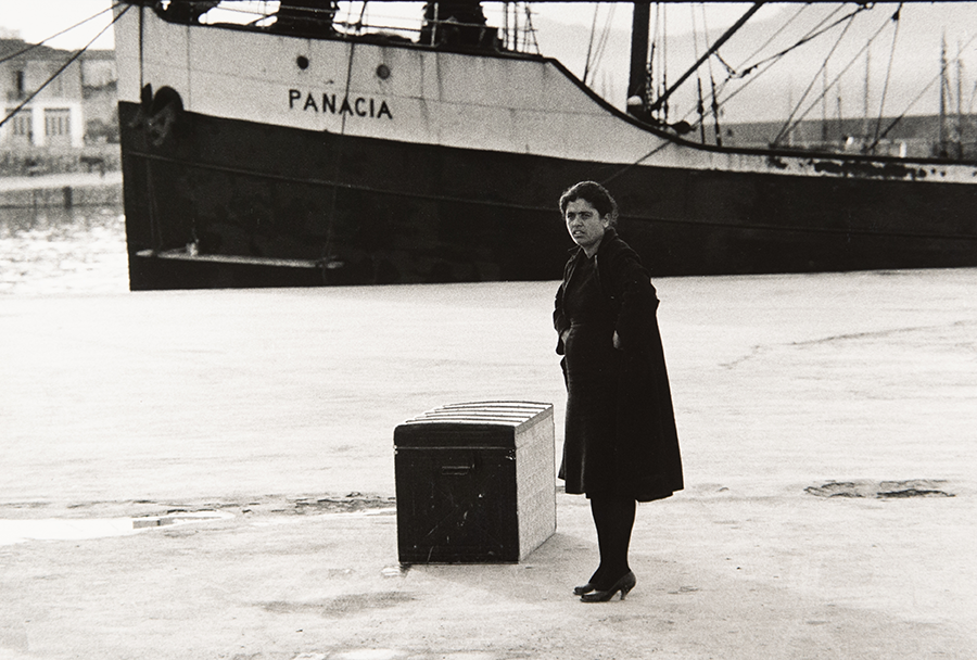 Woman waiting by boat