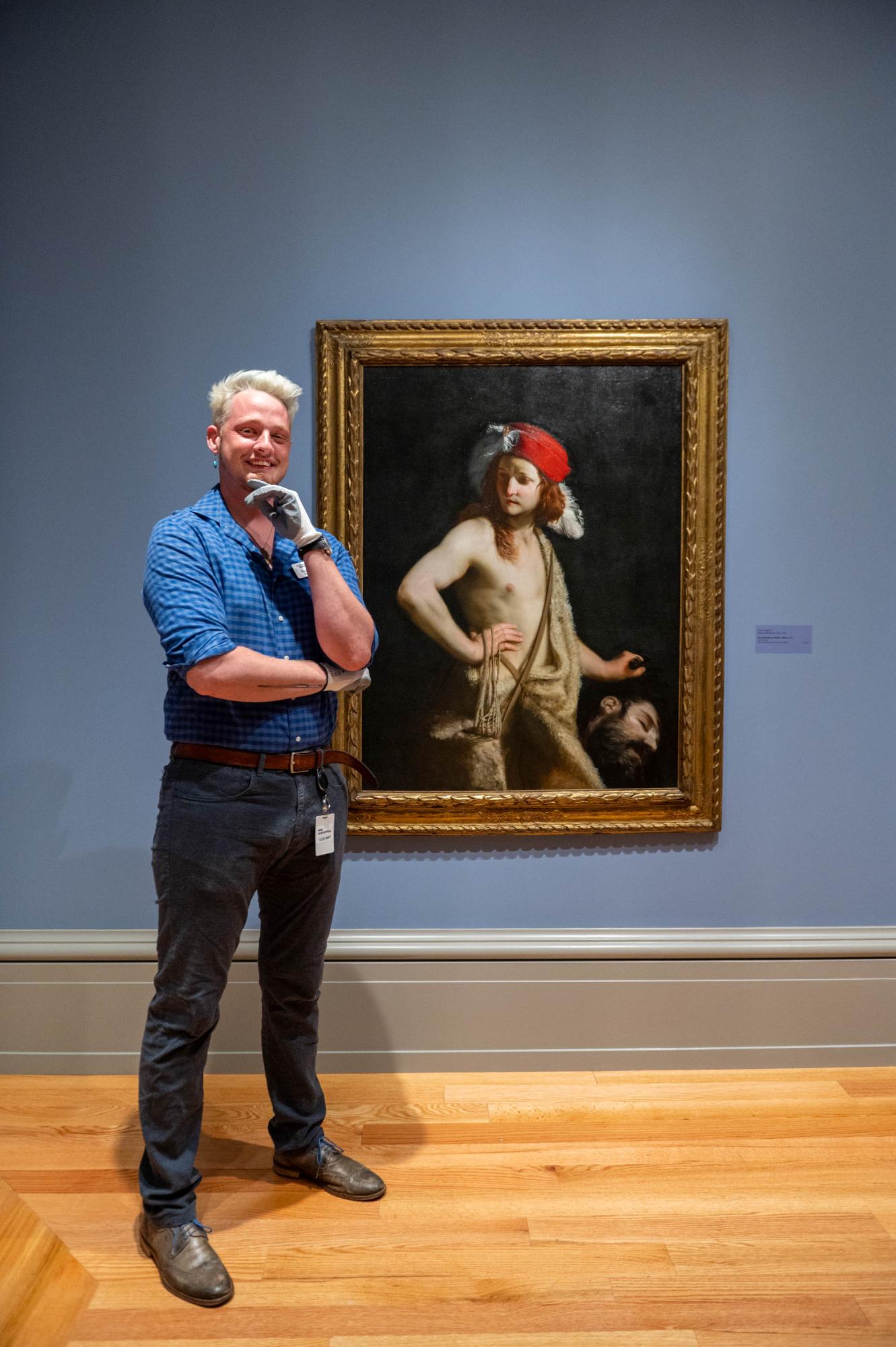 Thomas standing by Cagnacci's David Holding Goliath's Head