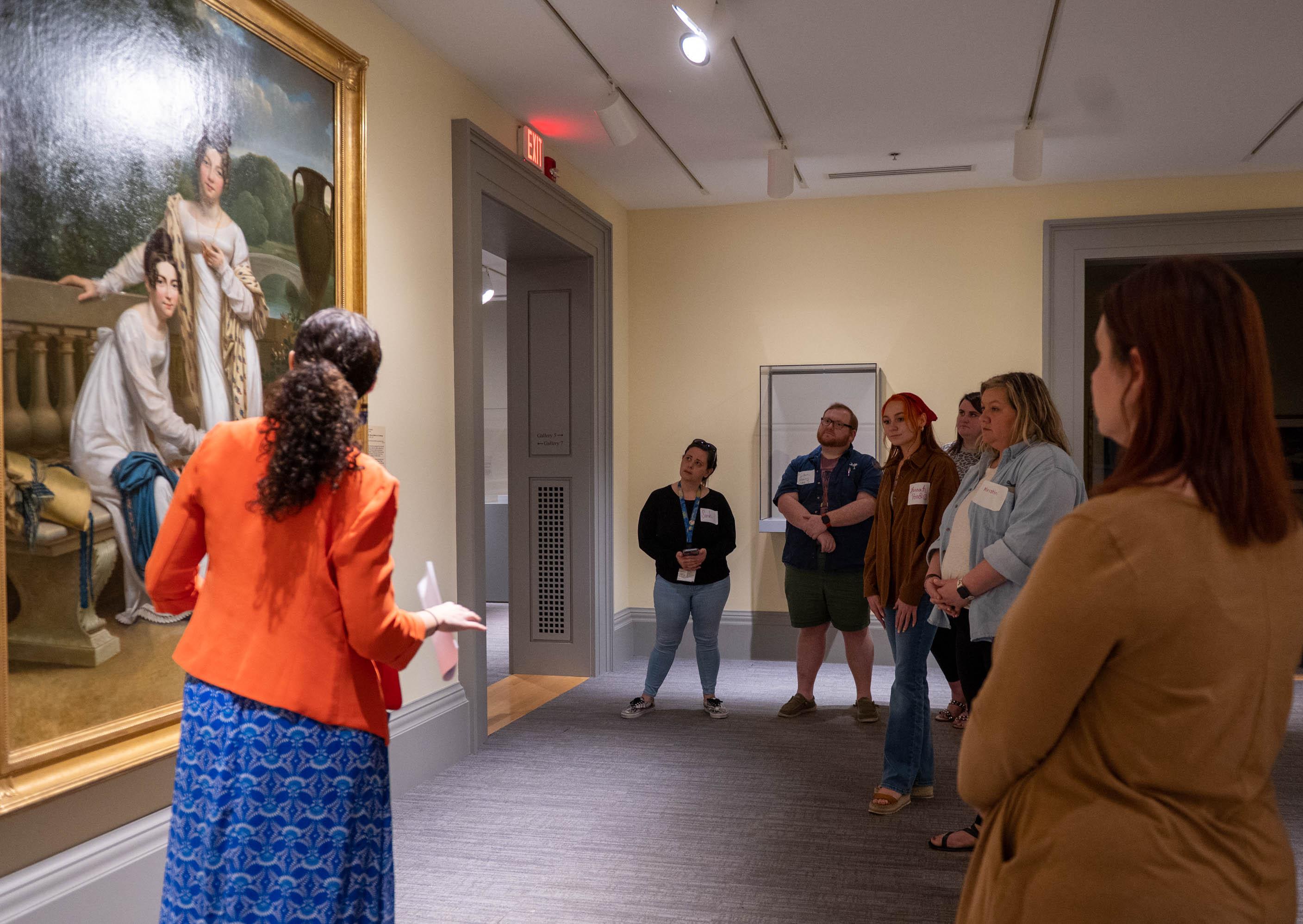 Visitors learning about art in Collection Galleries