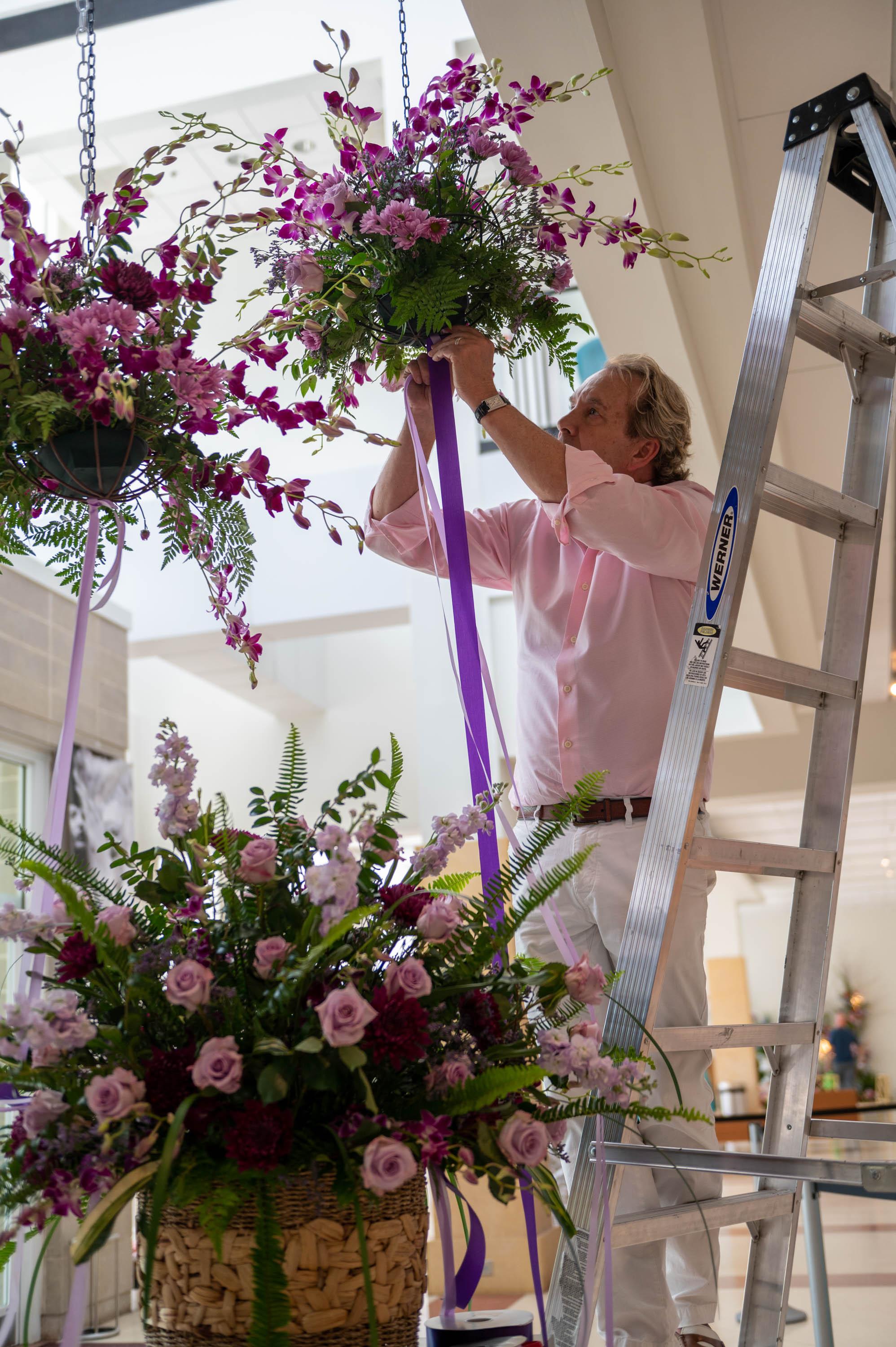 Steven Ford working on floral arrangement 