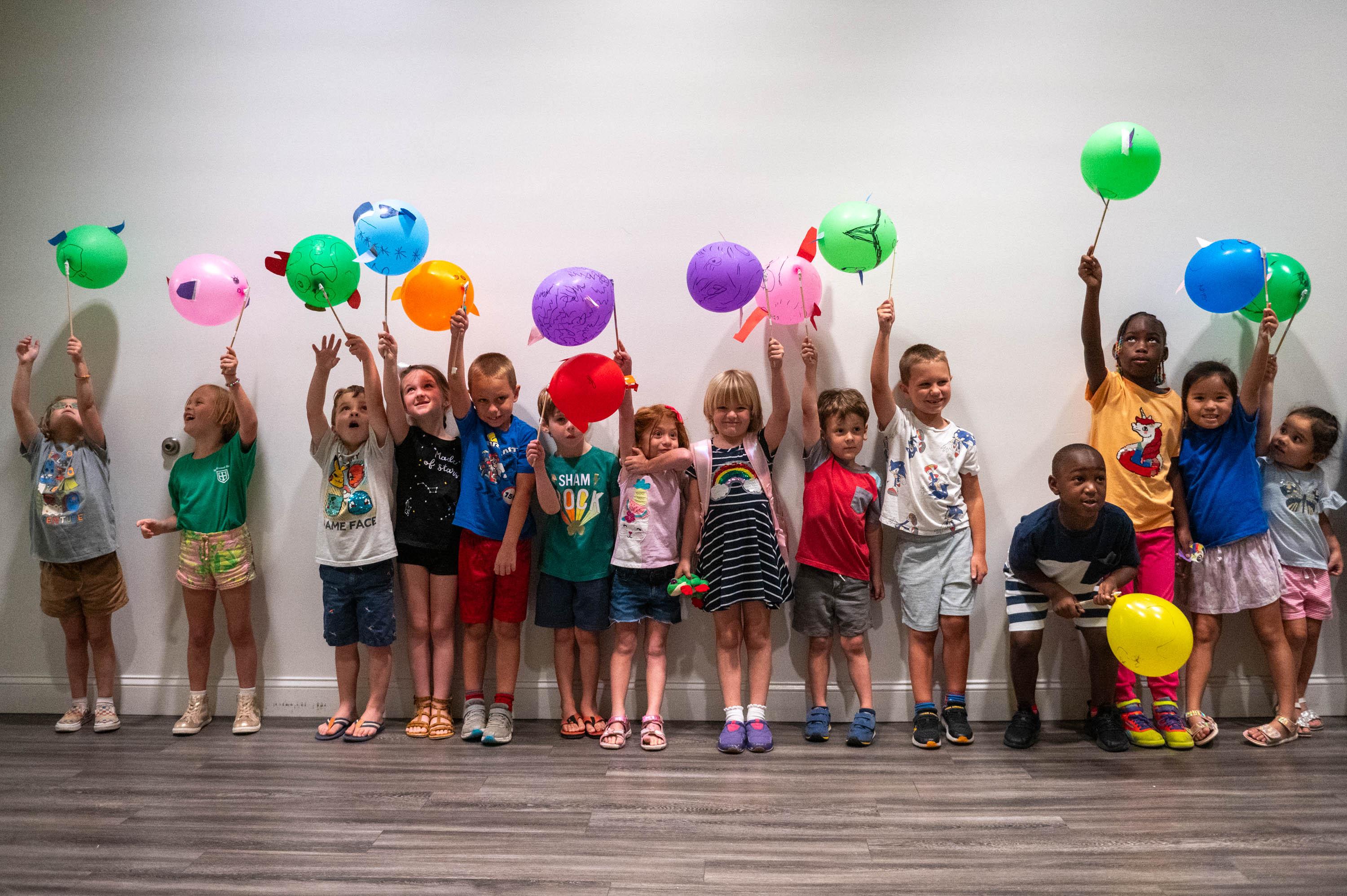 kids ages 4-6 with balloon animal creatures