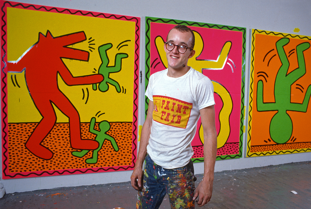 Haring in front of his work
